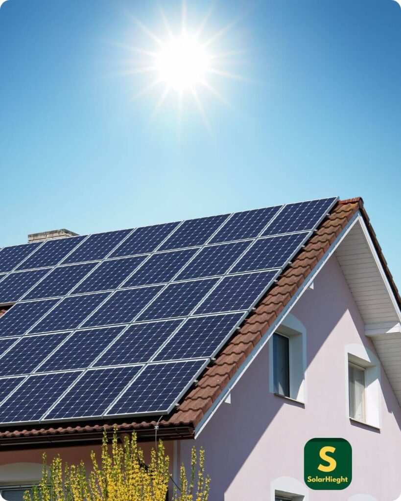 An image of sunlight above a solar panel rooftop an interaction that produces solar energy.